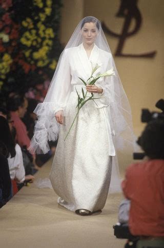 robe de mariée yves saint laurent prix|Yves Saint Laurent en 17 robes de mariée iconiques.